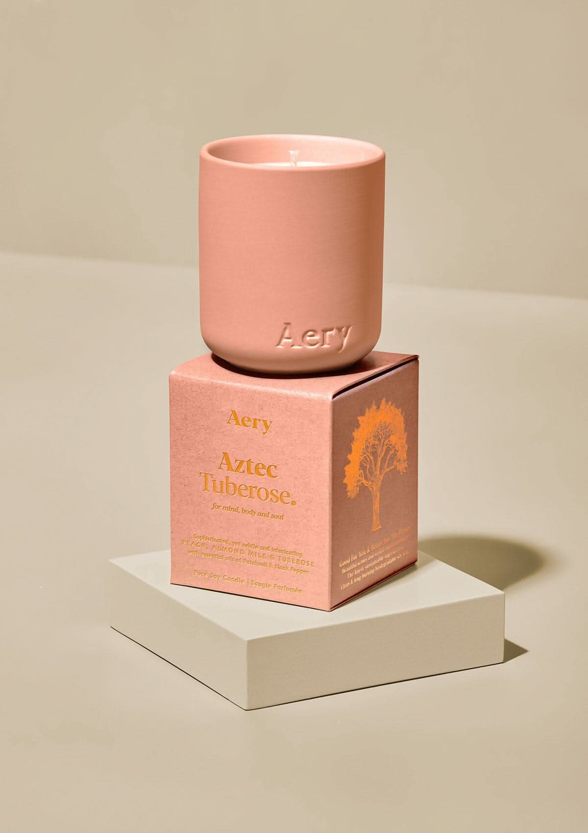 AERY AZTEC TUBEROSE SCENTED VOTIVE CANDLE